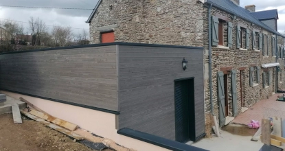 Image Création d'une extension semi-enterrée en ossature bois près de Villers-Bocage (14)